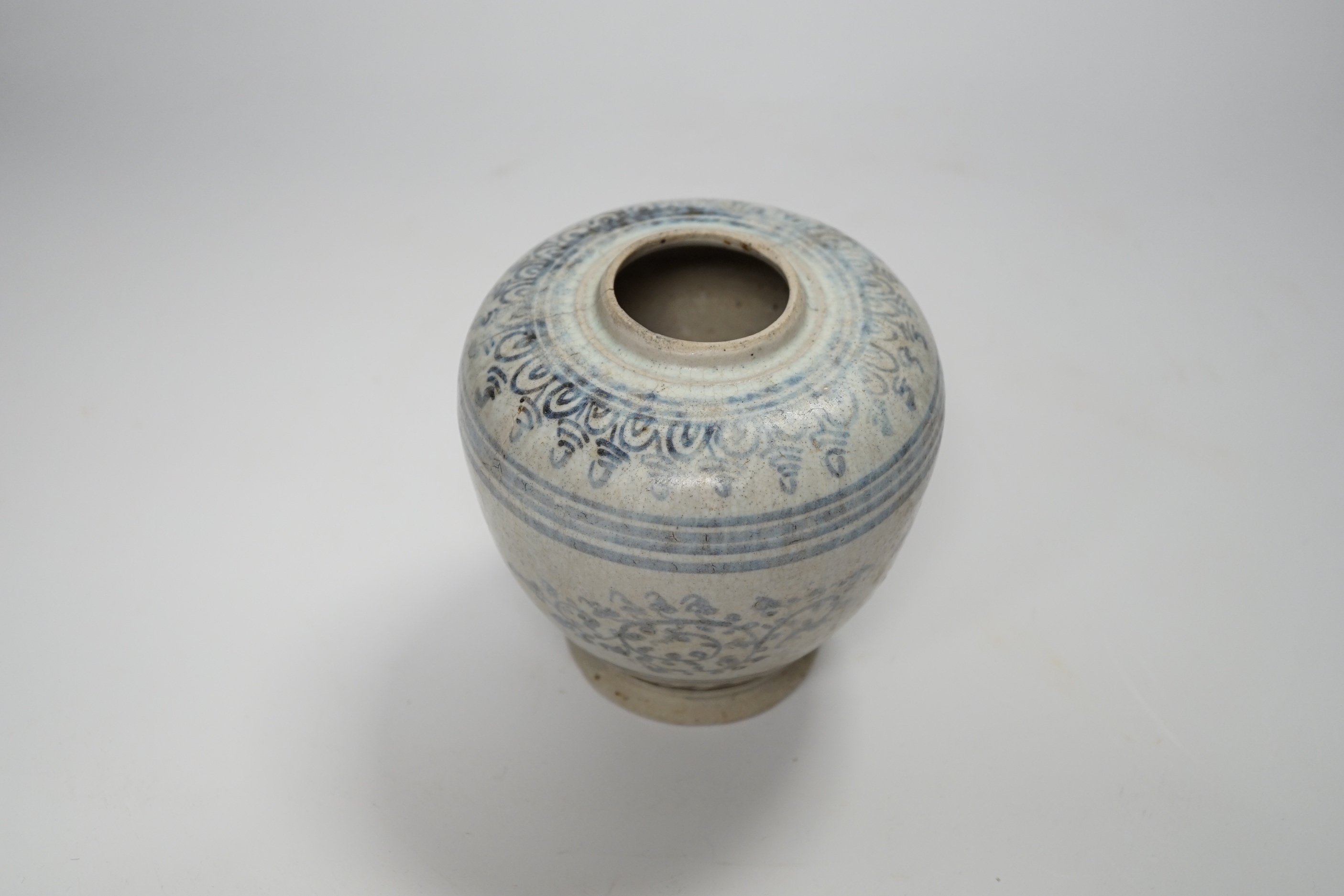 A Sawankhalok celadon jar, 15th/16th century, 13cm high